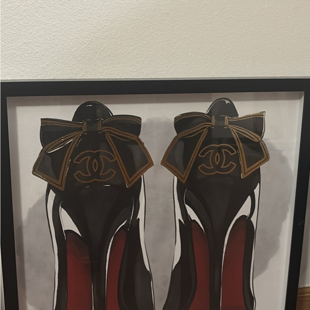 CHANEL Black and Gold Heels with Bow Accent